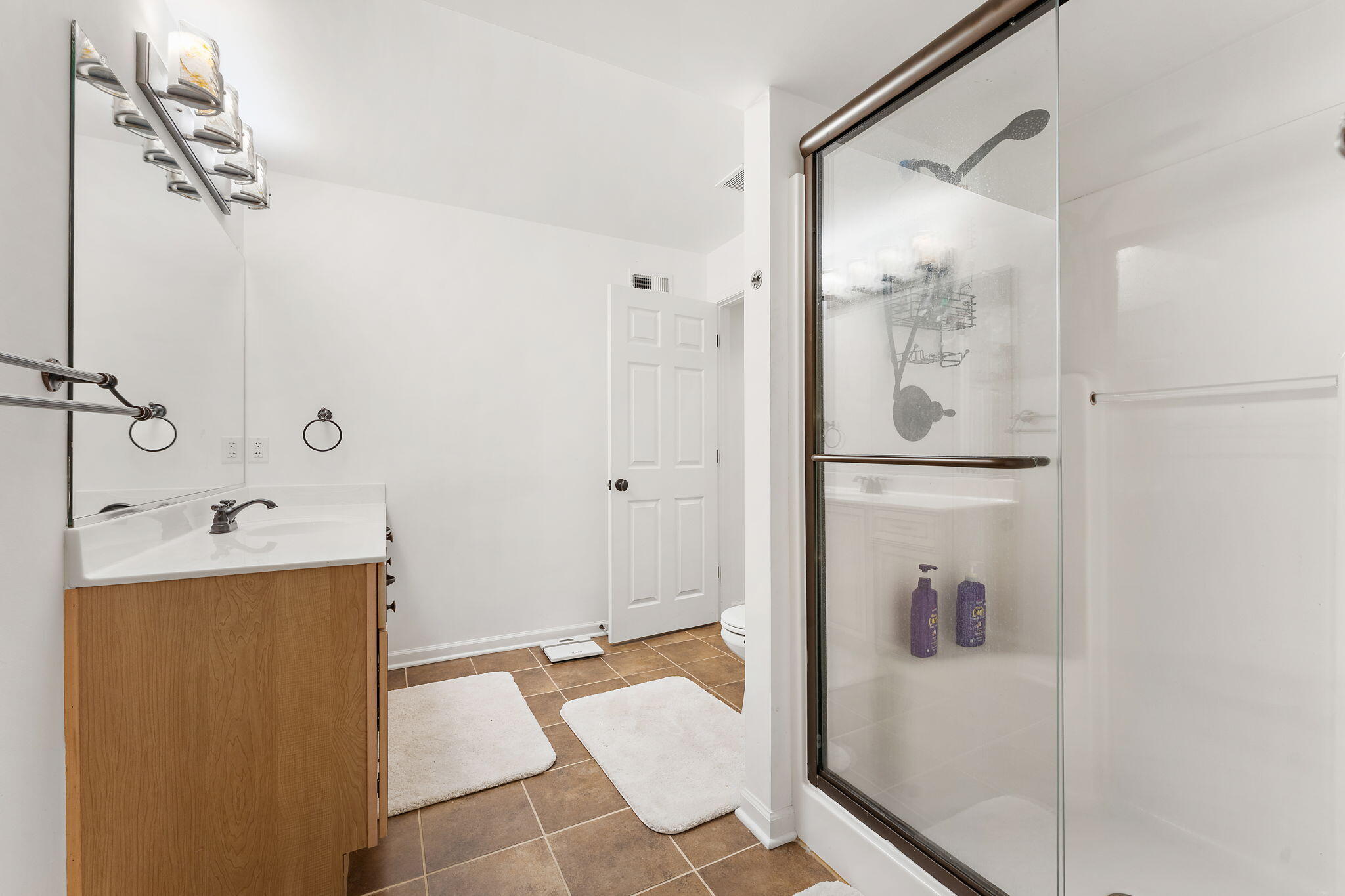 2335 Legend Circle Chesterton, IN 46304 - Photo 26 of 33 a bathroom with a tub and shower