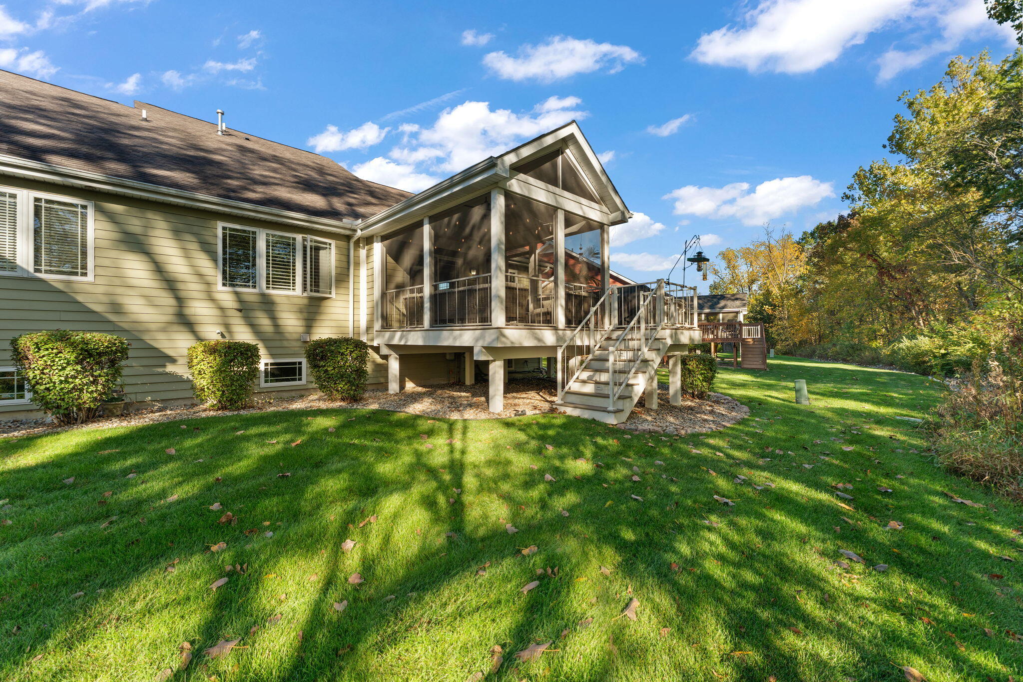 2335 Legend Circle Chesterton, IN 46304 - Photo 30 of 33 a view of a house with a yard porch and sitting area