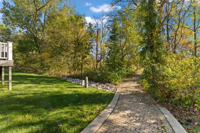 a view of a lake with a big yard
