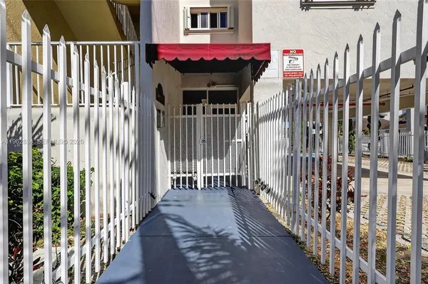 a view of a balcony with staircase