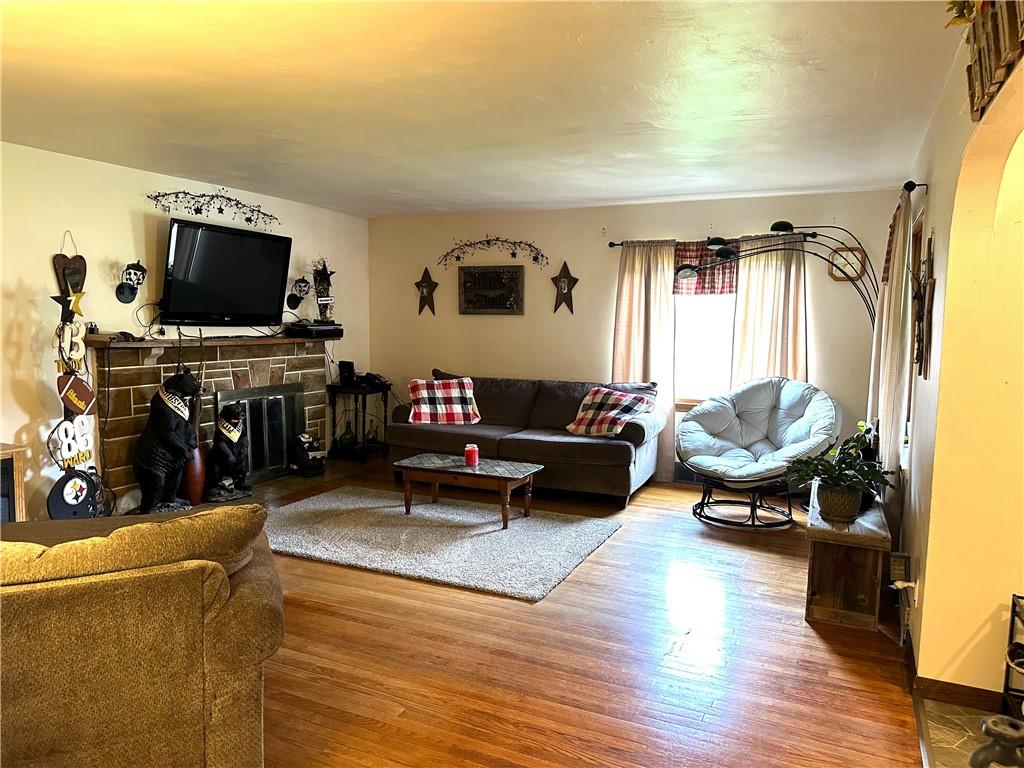 704 Middle 1st Street Rural Valley, PA 16249 - Photo 13 of 23 a living room with furniture and a flat screen tv