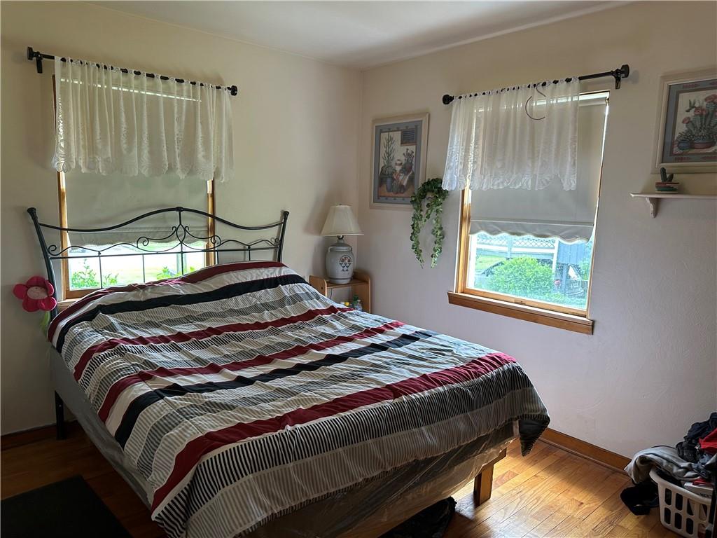 704 Middle 1st Street Rural Valley, PA 16249 - Photo 17 of 23 a bedroom with a bed and a window