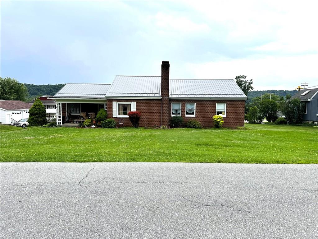 704 Middle 1st Street Rural Valley, PA 16249 - Photo 23 of 23 a front view of house with yard and green space