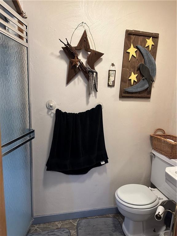 704 Middle 1st Street Rural Valley, PA 16249 - Photo 10 of 23 a bathroom with a toilet and a vanity