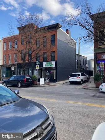 a car parked in front of a building