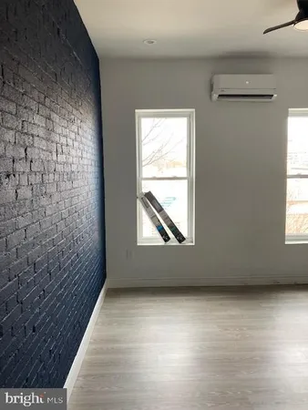 en empty room with windows