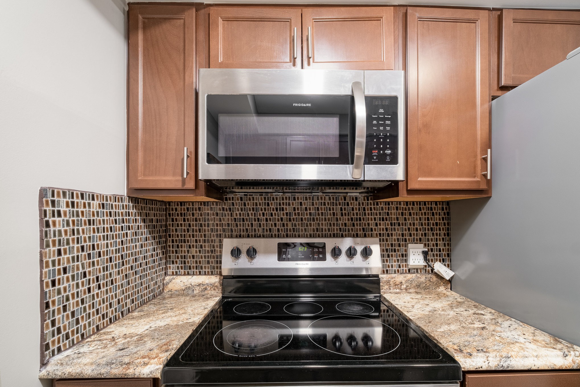 500 Paragon Mills Road, Unit N1 Nashville, TN 37211 - Photo 14 of 31 a stove top oven sitting inside of a kitchen