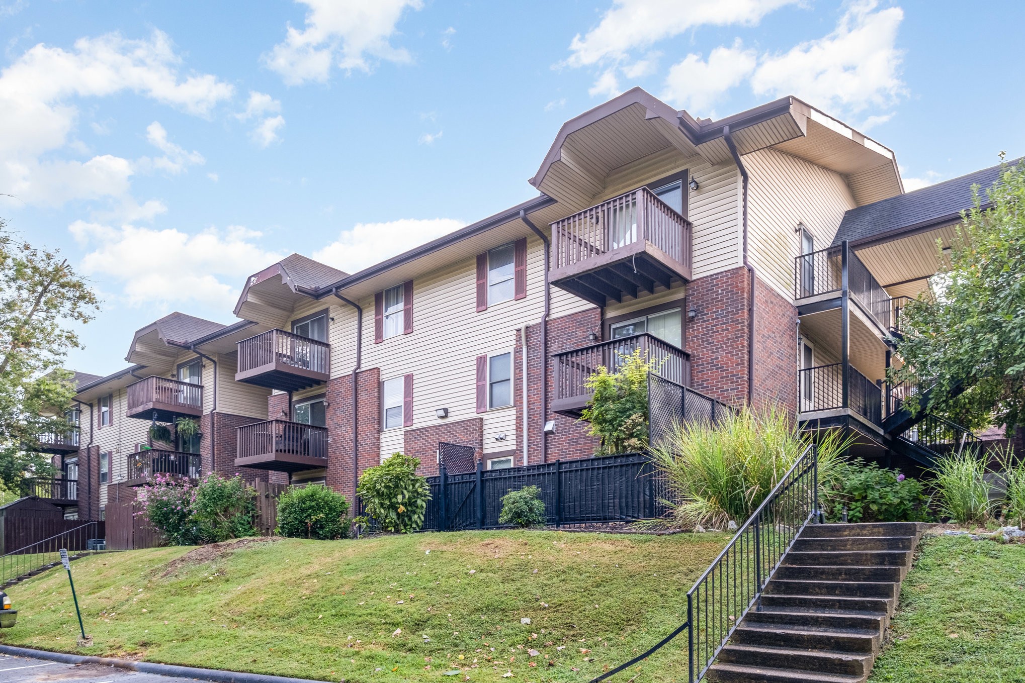 500 Paragon Mills Road, Unit N1 Nashville, TN 37211 - Photo 2 of 31 a view of a house with a yard