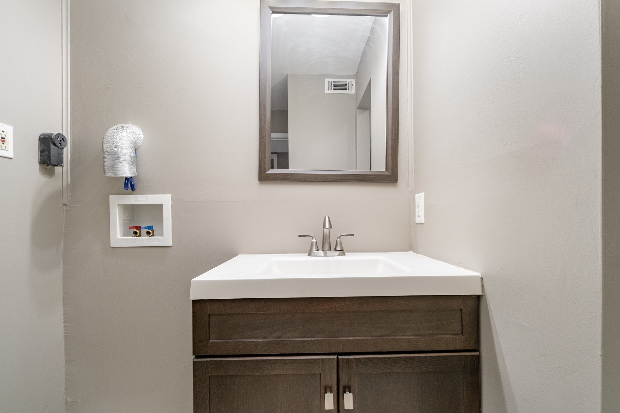 500 Paragon Mills Road, Unit N1 Nashville, TN 37211 - Photo 25 of 31 a bathroom with a sink and a mirror