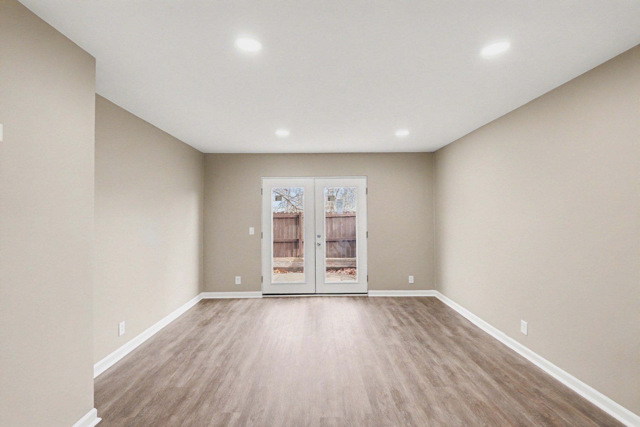 500 Paragon Mills Road, Unit N1 Nashville, TN 37211 - Photo 3 of 31 an empty room with wooden floor