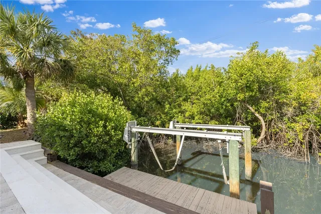 a view of a balcony with chairs