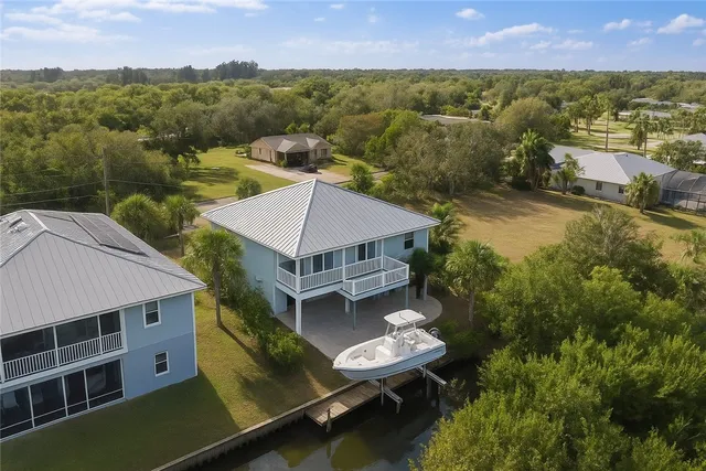 aerial view of a house with a garden