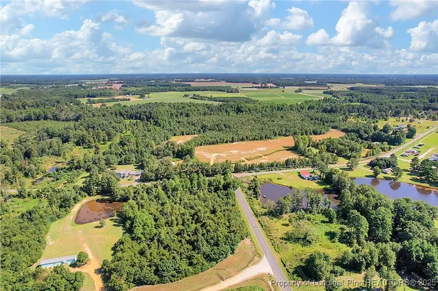 a view of a yard with an outdoor space