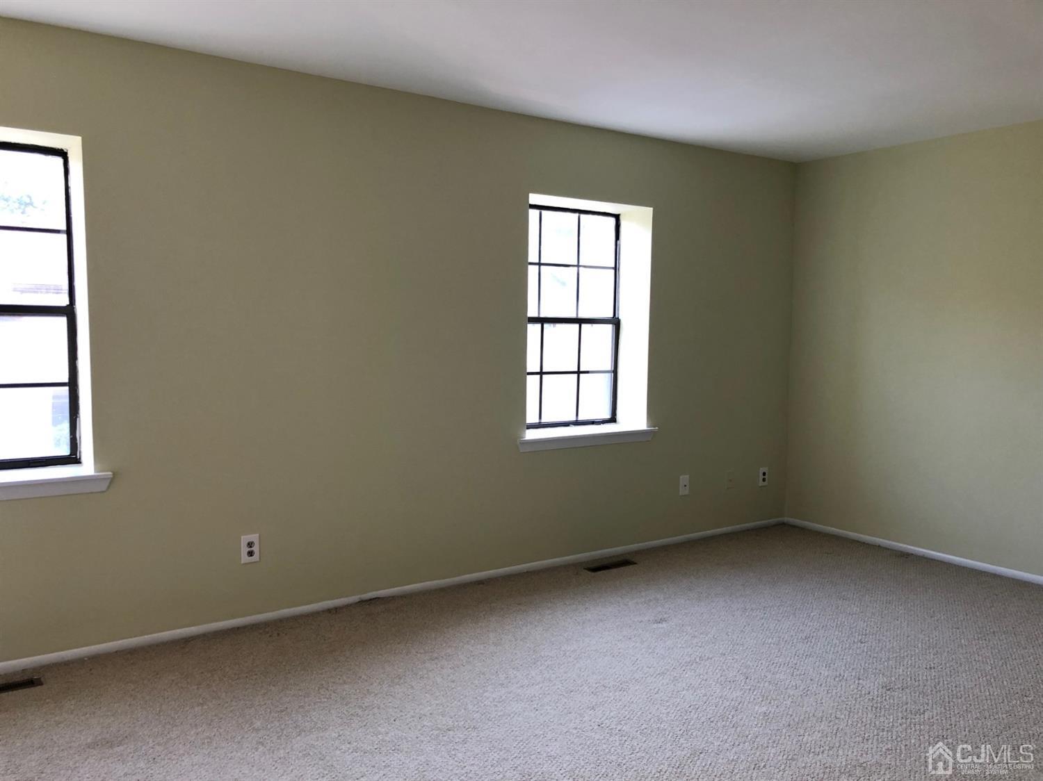 7706 Hana Road Edison, NJ 08817 - Photo 13 of 28 an empty room with a window