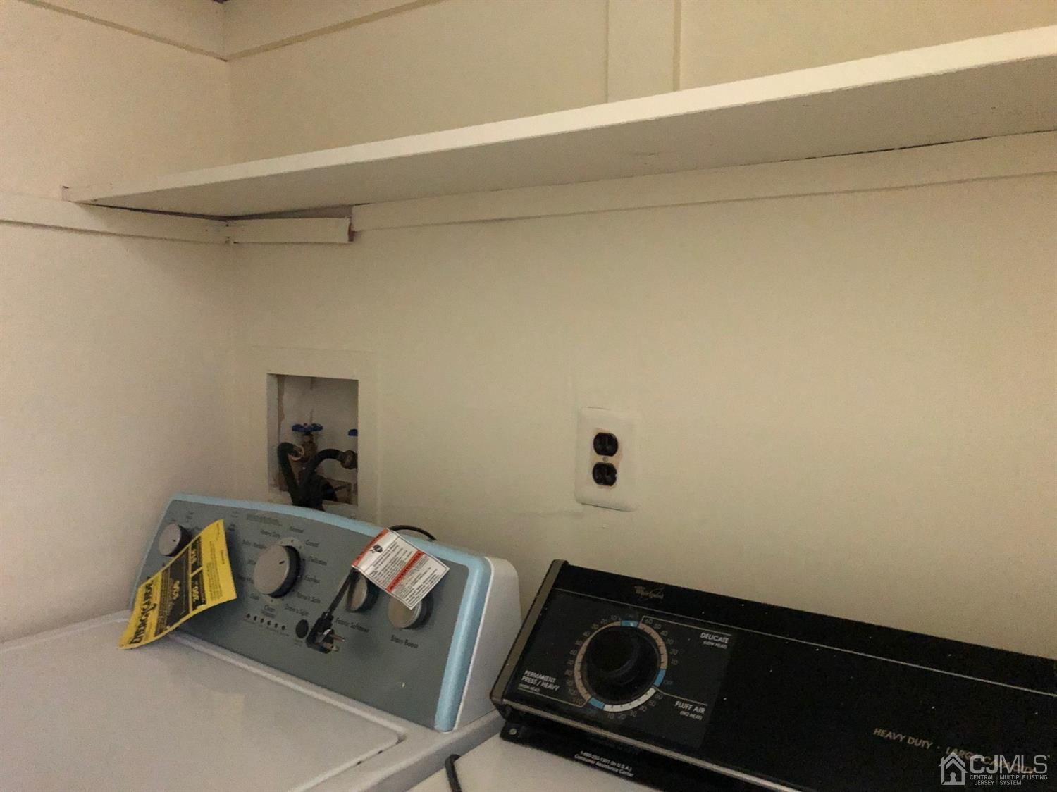 7706 Hana Road Edison, NJ 08817 - Photo 19 of 28 a utility room with dryer and washer