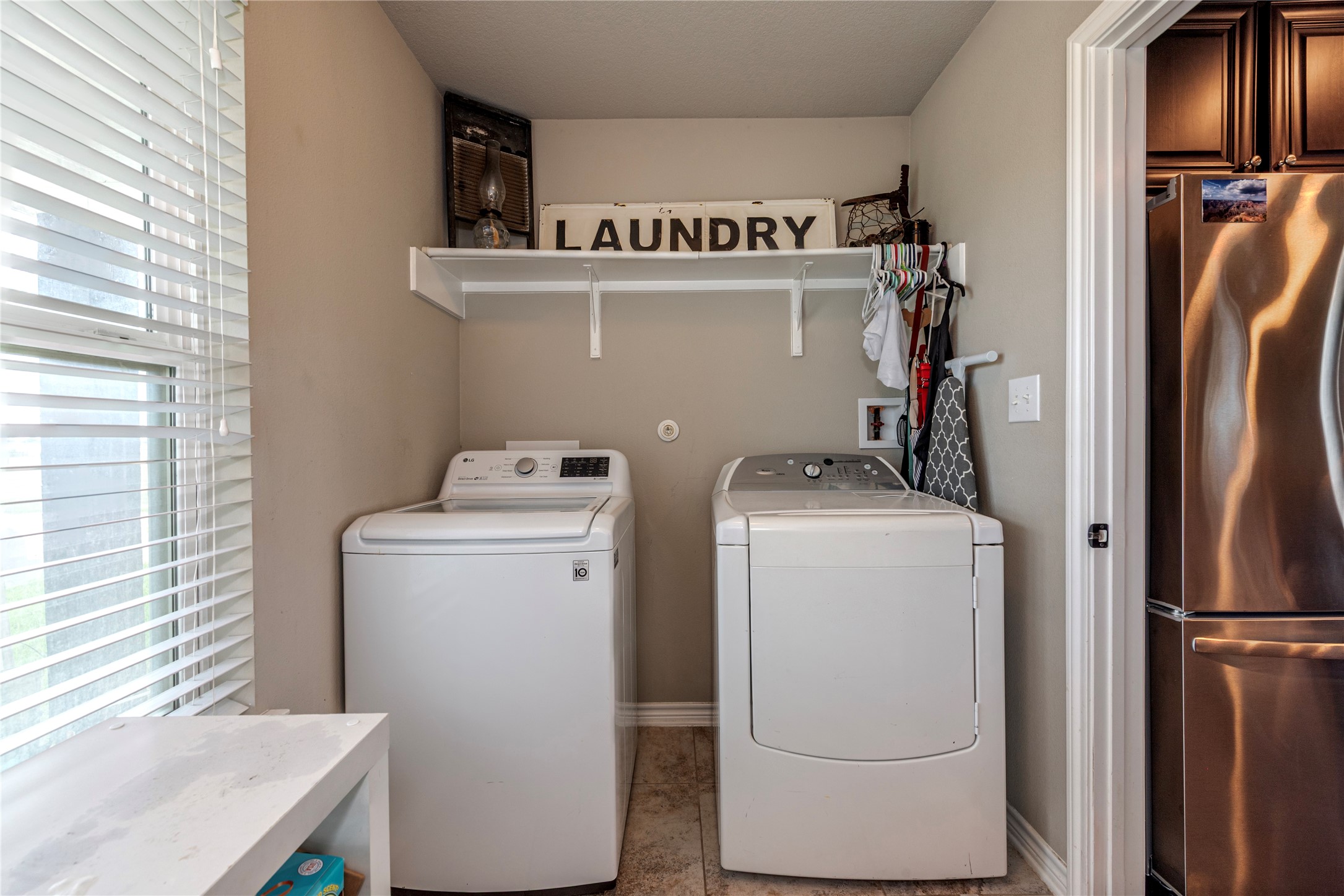 4288 FM 2546 Road El Campo, TX 77437 - Photo 14 of 26 a utility room with dryer and washer