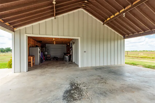 a view of a room with wooden walls