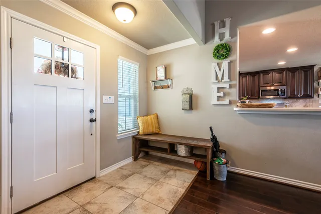a room with furniture and a wooden floor