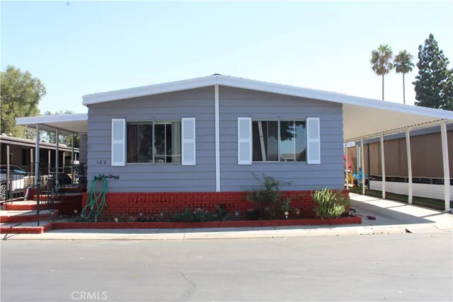 a front view of a house with garage