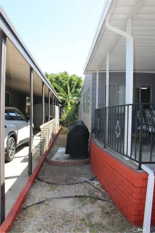 a front view of house with a garden