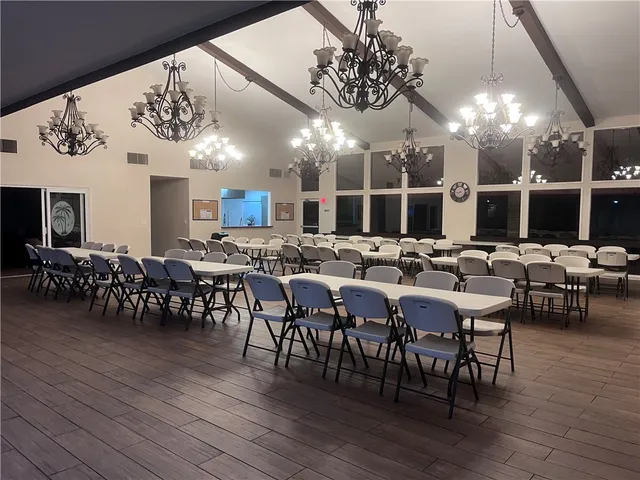 a view of a backyard with a sitting area and furniture