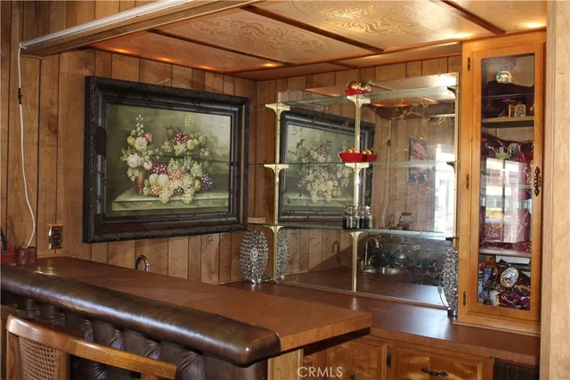 a view of a chairs and table in a patio