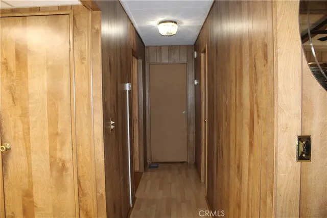 a kitchen with a refrigerator and a stove