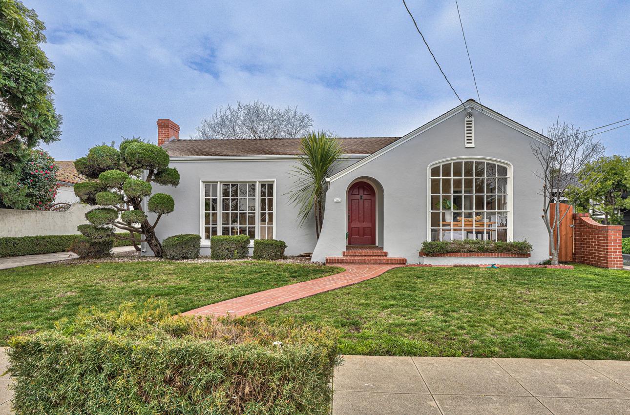 160 Lorimer Street Salinas, CA 93901 - Photo 1 of 45 a front view of a house with a yard and garage