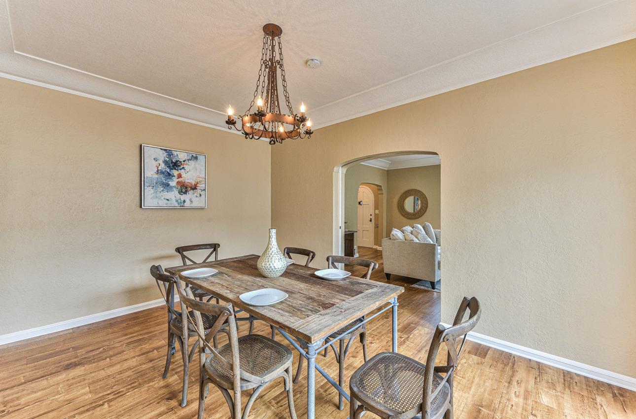 160 Lorimer Street Salinas, CA 93901 - Photo 13 of 45 a view of a dining room with furniture wooden floor and a chandelier