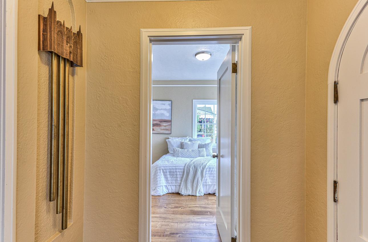 160 Lorimer Street Salinas, CA 93901 - Photo 22 of 45 a bedroom with a bed and wooden floor