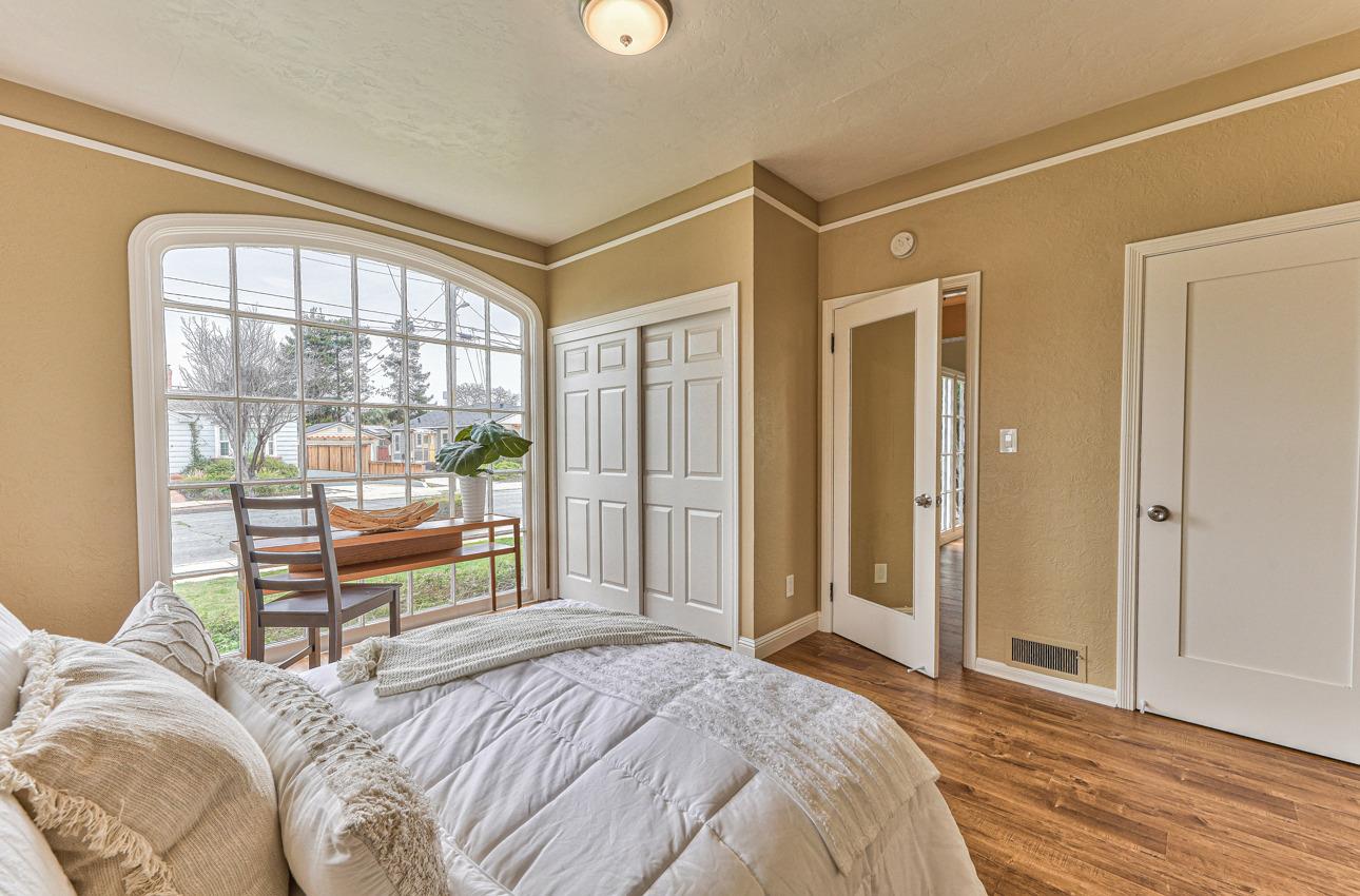 160 Lorimer Street Salinas, CA 93901 - Photo 24 of 45 a bedroom with a bed and large window