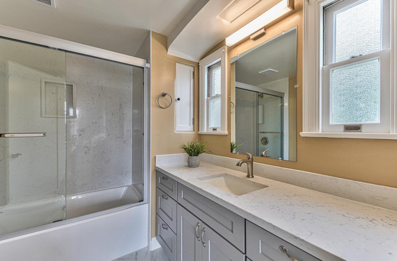 160 Lorimer Street Salinas, CA 93901 - Photo 27 of 45 a bathroom with a sink and a bathtub