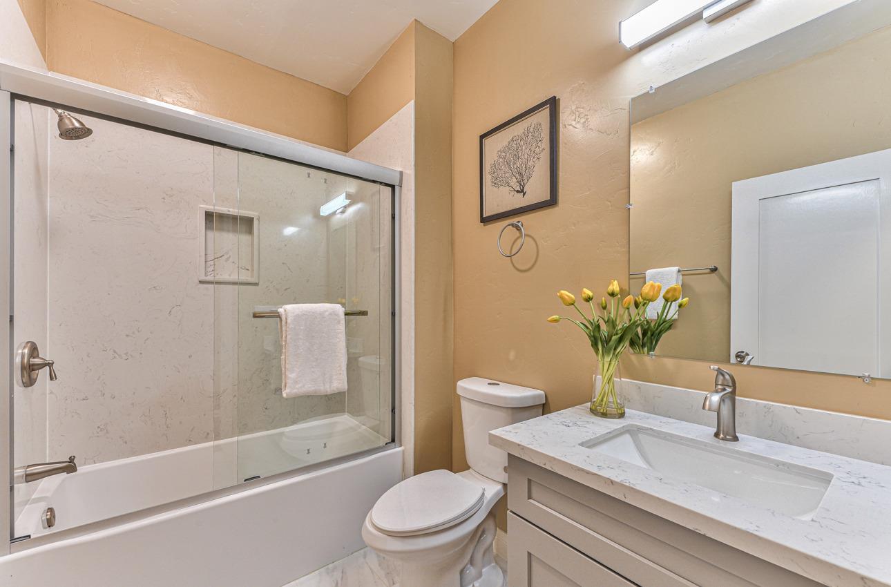 160 Lorimer Street Salinas, CA 93901 - Photo 36 of 45 a bath room with a toilet a sink and a bath tub
