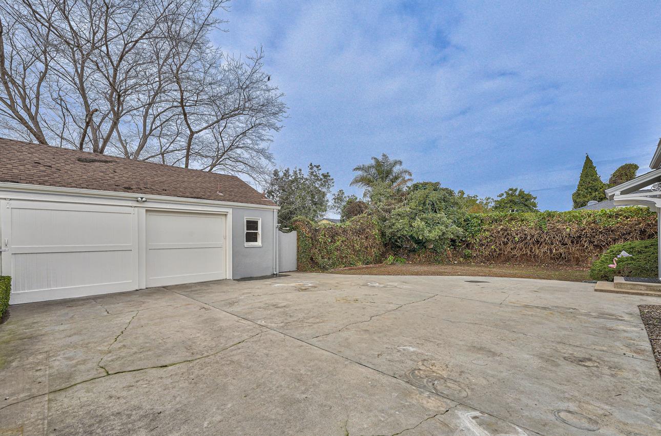 160 Lorimer Street Salinas, CA 93901 - Photo 38 of 45 a front view of a house with a yard and garage