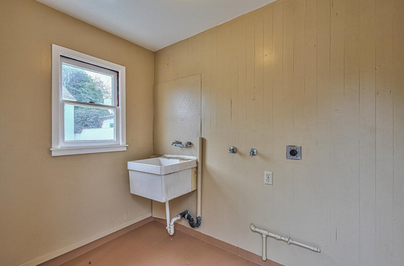 160 Lorimer Street Salinas, CA 93901 - Photo 45 of 45 a bathroom with a sink a mirror and a window