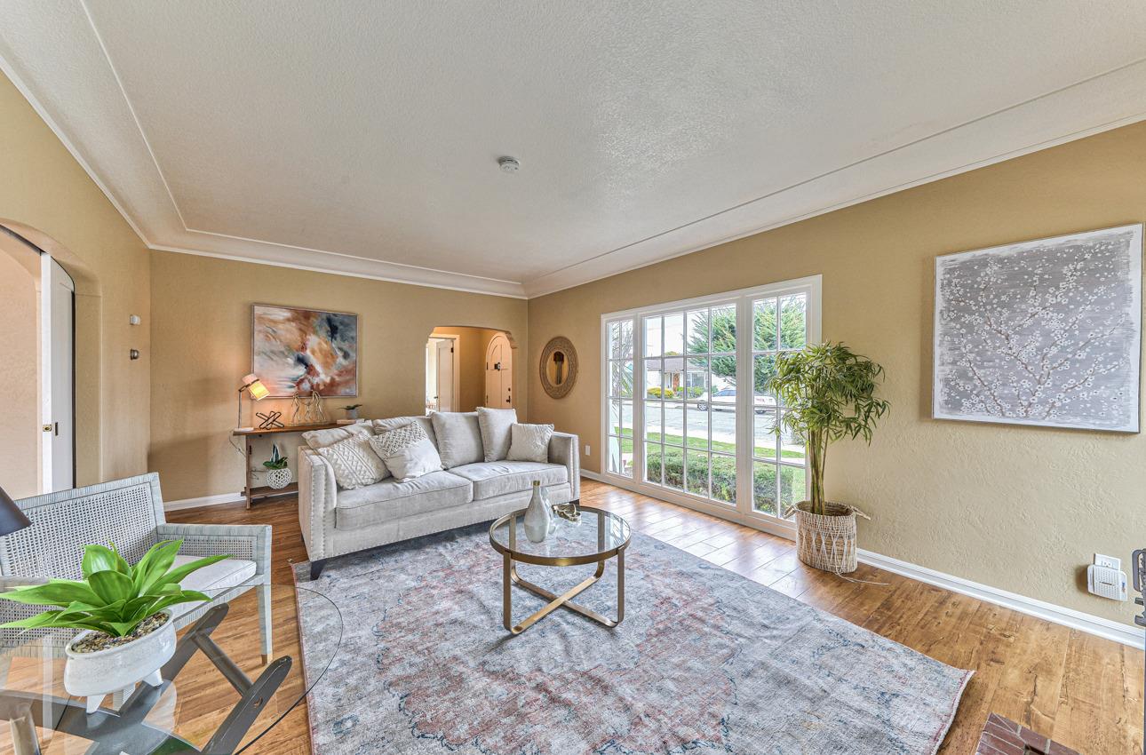 160 Lorimer Street Salinas, CA 93901 - Photo 9 of 45 a living room with furniture and a large window