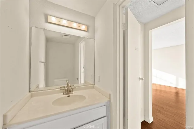 a bathroom with a bathtub and a sink