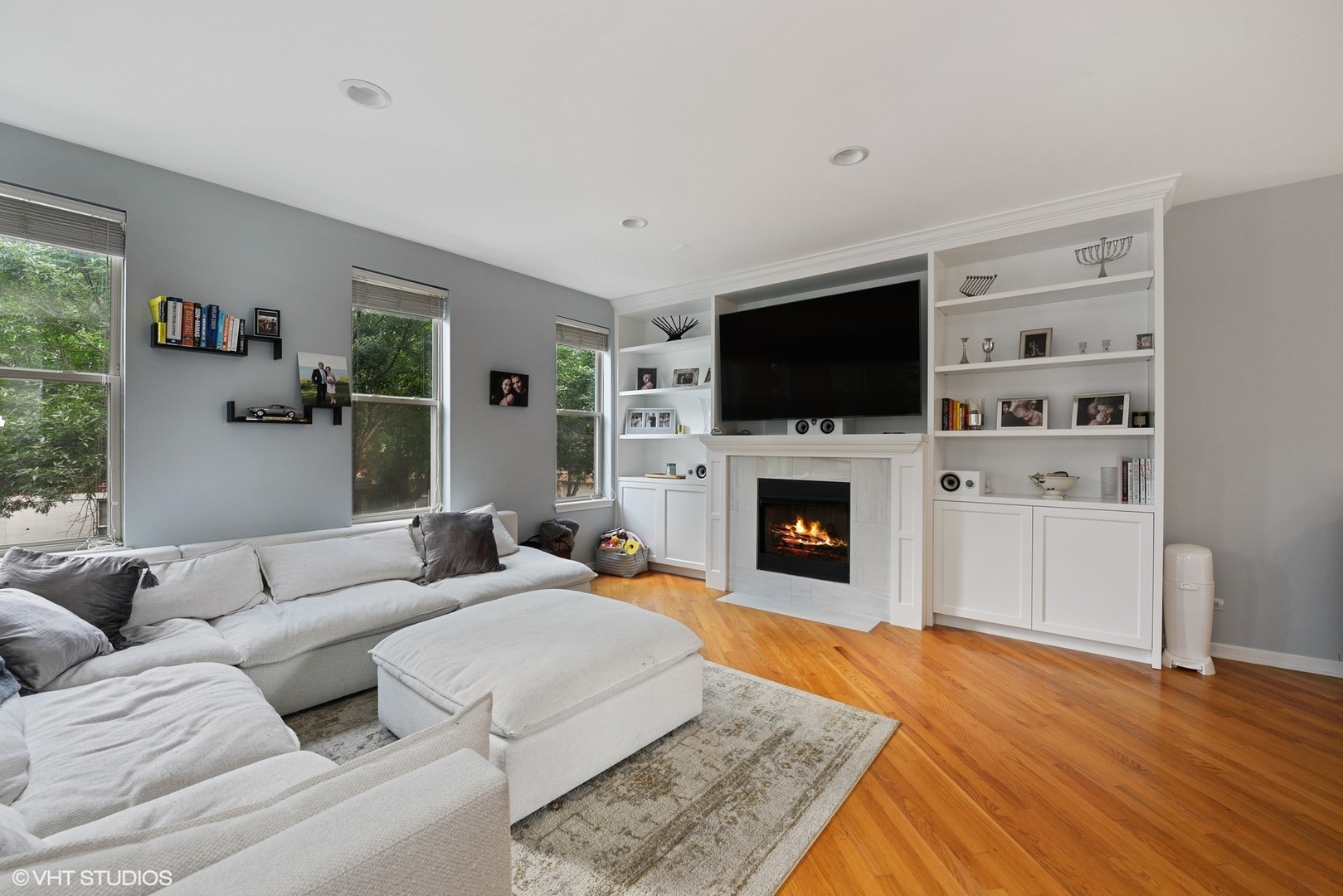1344 North Burling Street Chicago, IL 60642 - Photo 2 of 21 a living room with fireplace furniture and a flat screen tv