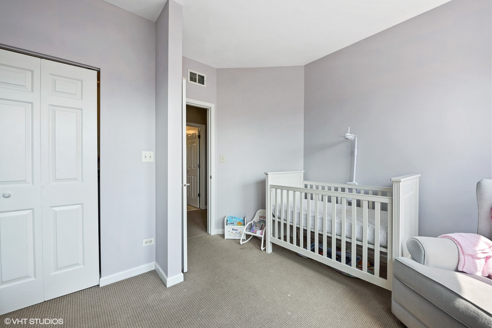 1344 North Burling Street Chicago, IL 60642 - Photo 11 of 21 a view of a room with furniture and bedroom view