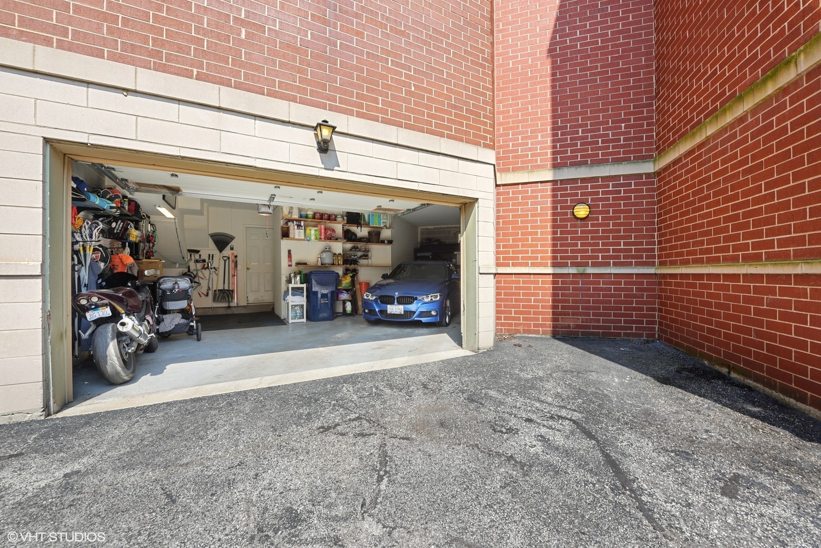 1344 North Burling Street Chicago, IL 60642 - Photo 16 of 21 a view of a garage with rack and bicycle