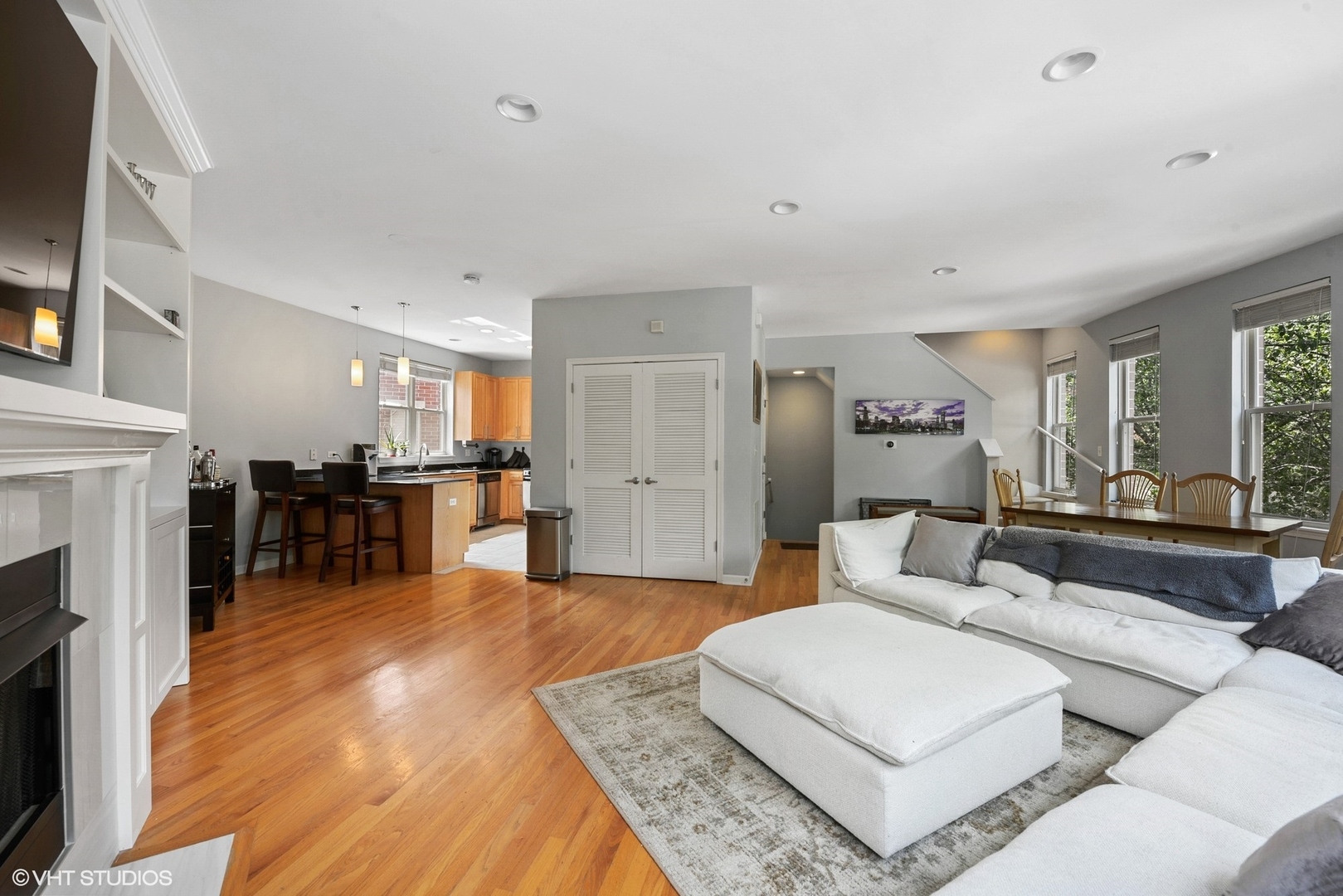 1344 North Burling Street Chicago, IL 60642 - Photo 4 of 21 a living room with furniture and a fireplace