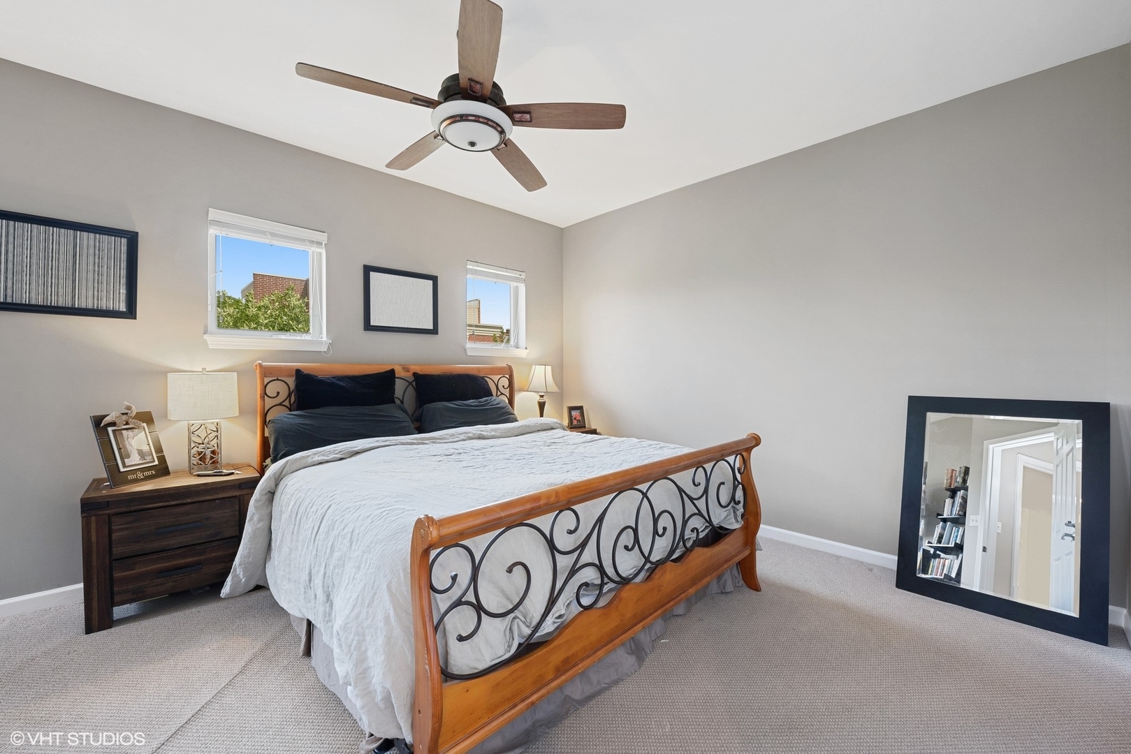 1344 North Burling Street Chicago, IL 60642 - Photo 7 of 21 a bedroom with a bed and a chandelier