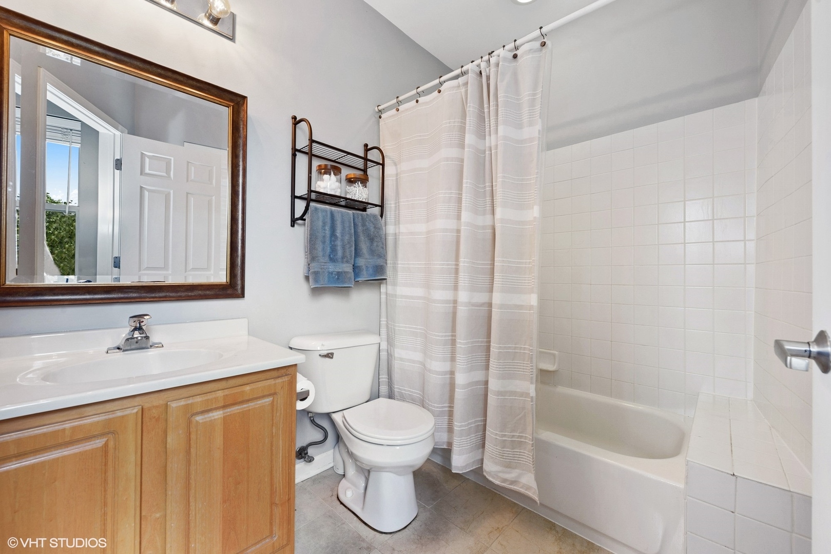 1344 North Burling Street Chicago, IL 60642 - Photo 9 of 21 a bathroom with a sink toilet and shower