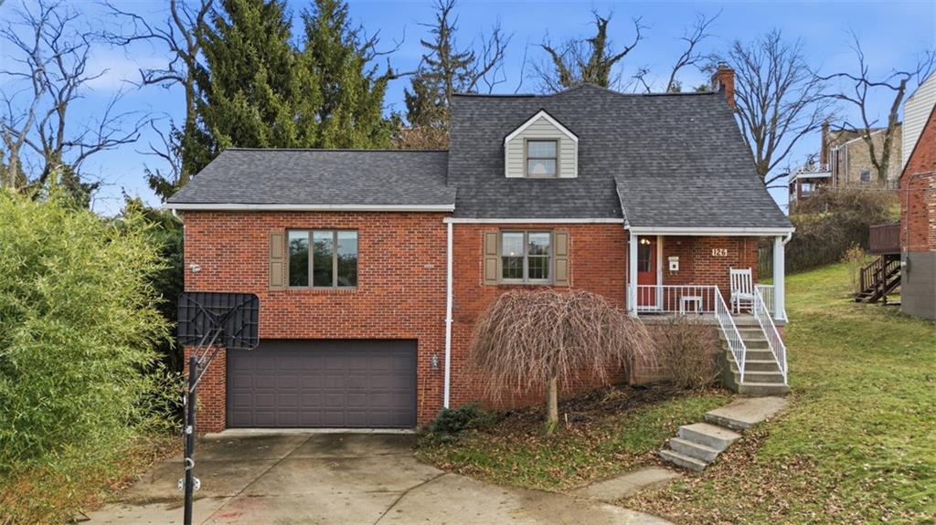 126 Leon Road Pittsburgh, PA 15220 - Photo 1 of 50 front view of a house with a yard