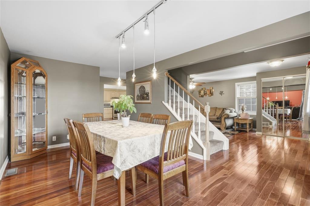 126 Leon Road Pittsburgh, PA 15220 - Photo 19 of 50 a view of a dining room with furniture and wooden floor