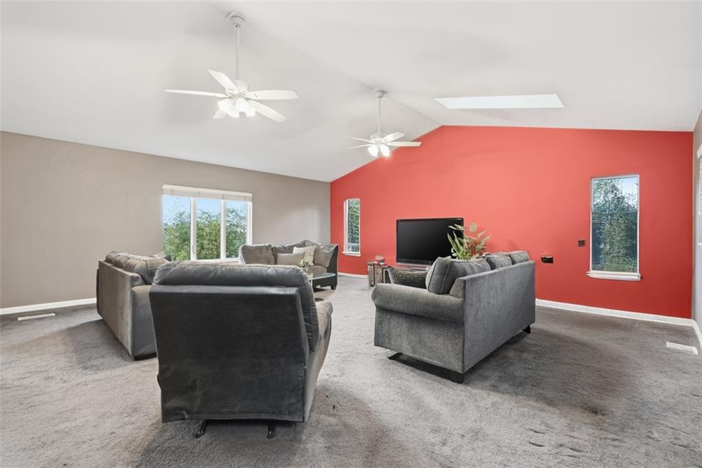 126 Leon Road Pittsburgh, PA 15220 - Photo 22 of 50 a living room with furniture and a window