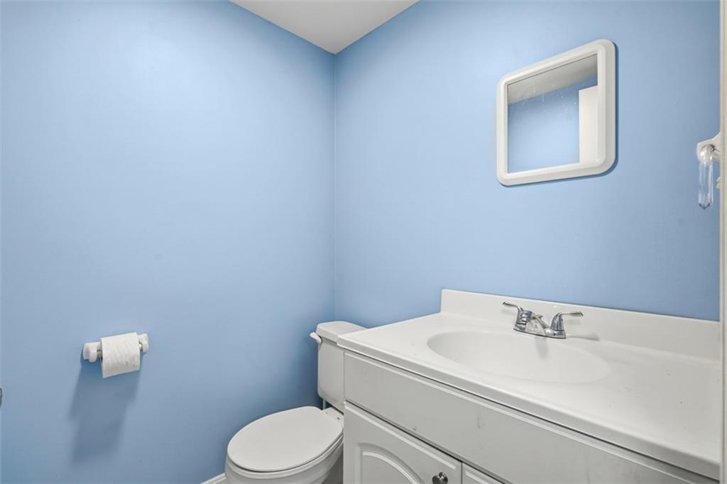 126 Leon Road Pittsburgh, PA 15220 - Photo 23 of 50 a white toilet sitting next to a white sink