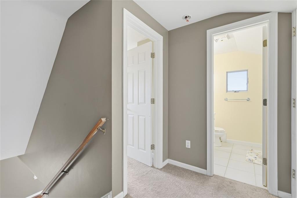 126 Leon Road Pittsburgh, PA 15220 - Photo 27 of 50 a view of a hallway with closet and wooden floor