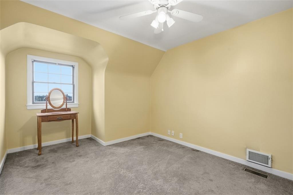 126 Leon Road Pittsburgh, PA 15220 - Photo 29 of 50 a view of a room with a piano and wooden floor