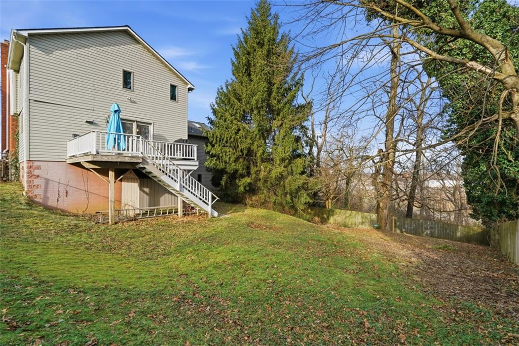 126 Leon Road Pittsburgh, PA 15220 - Photo 40 of 50 a view of a house with a yard